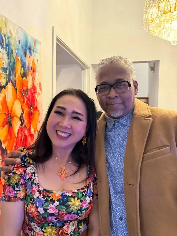 Ken with community member