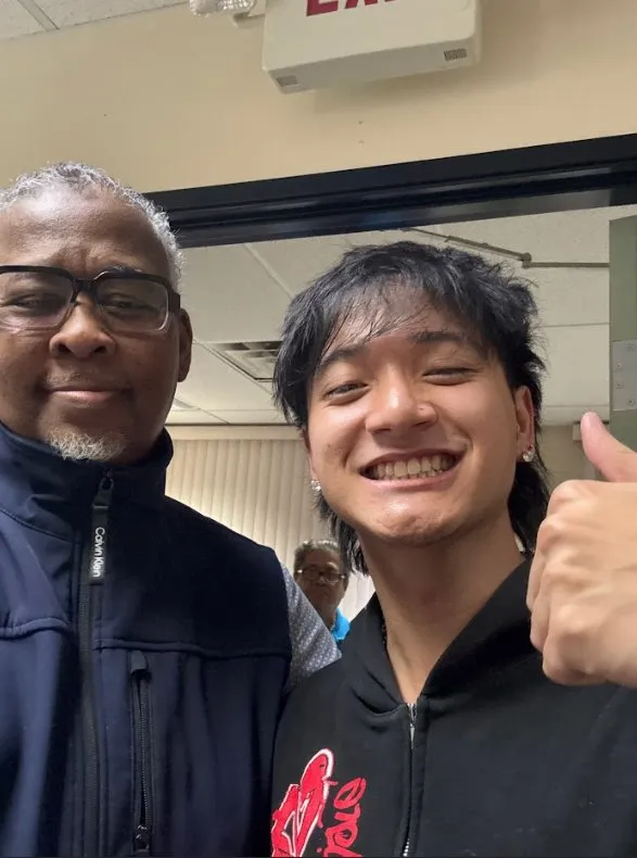 Ken with community member