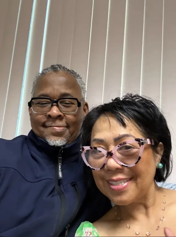 Ken with community member